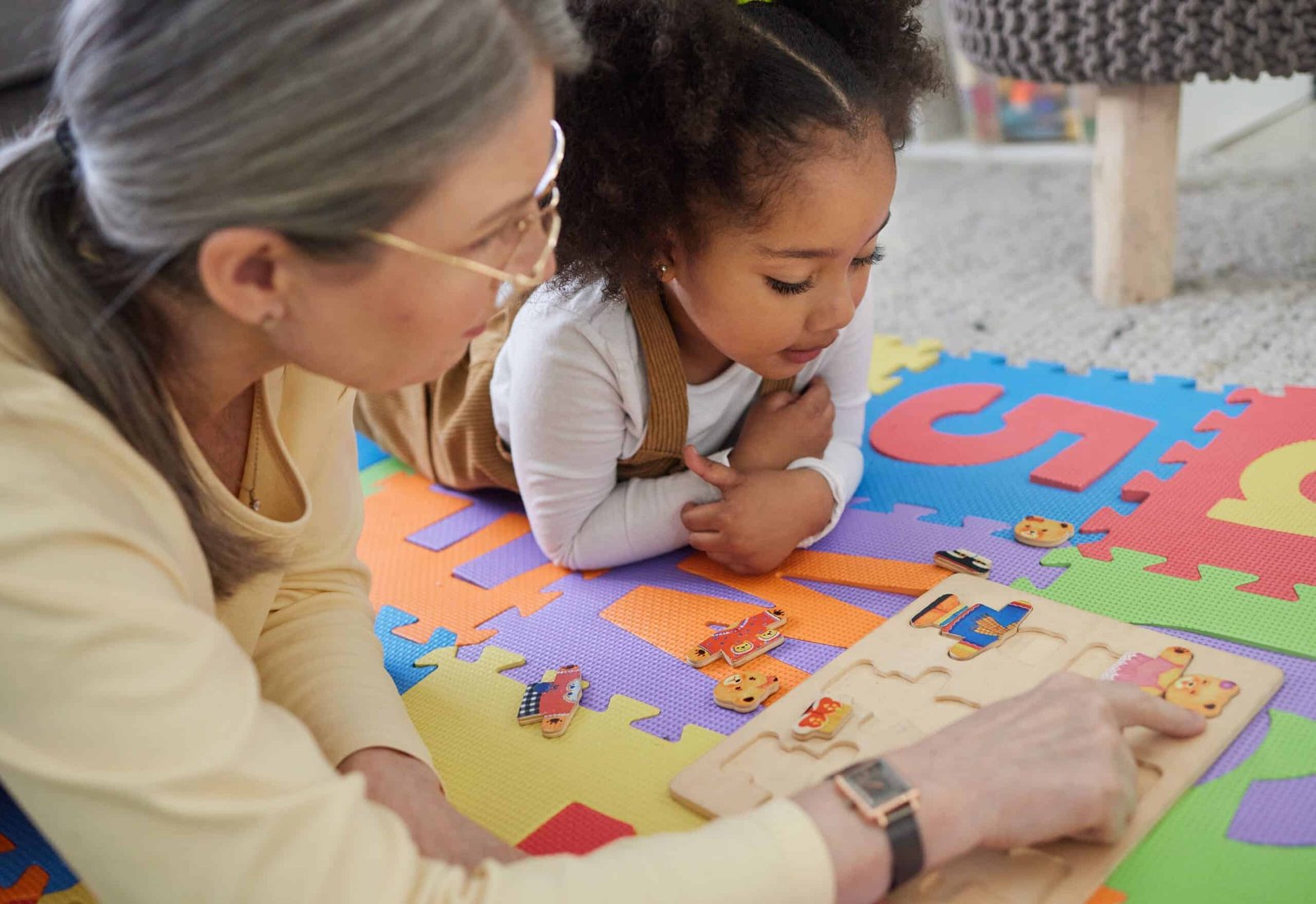 Parent helping child with their homework